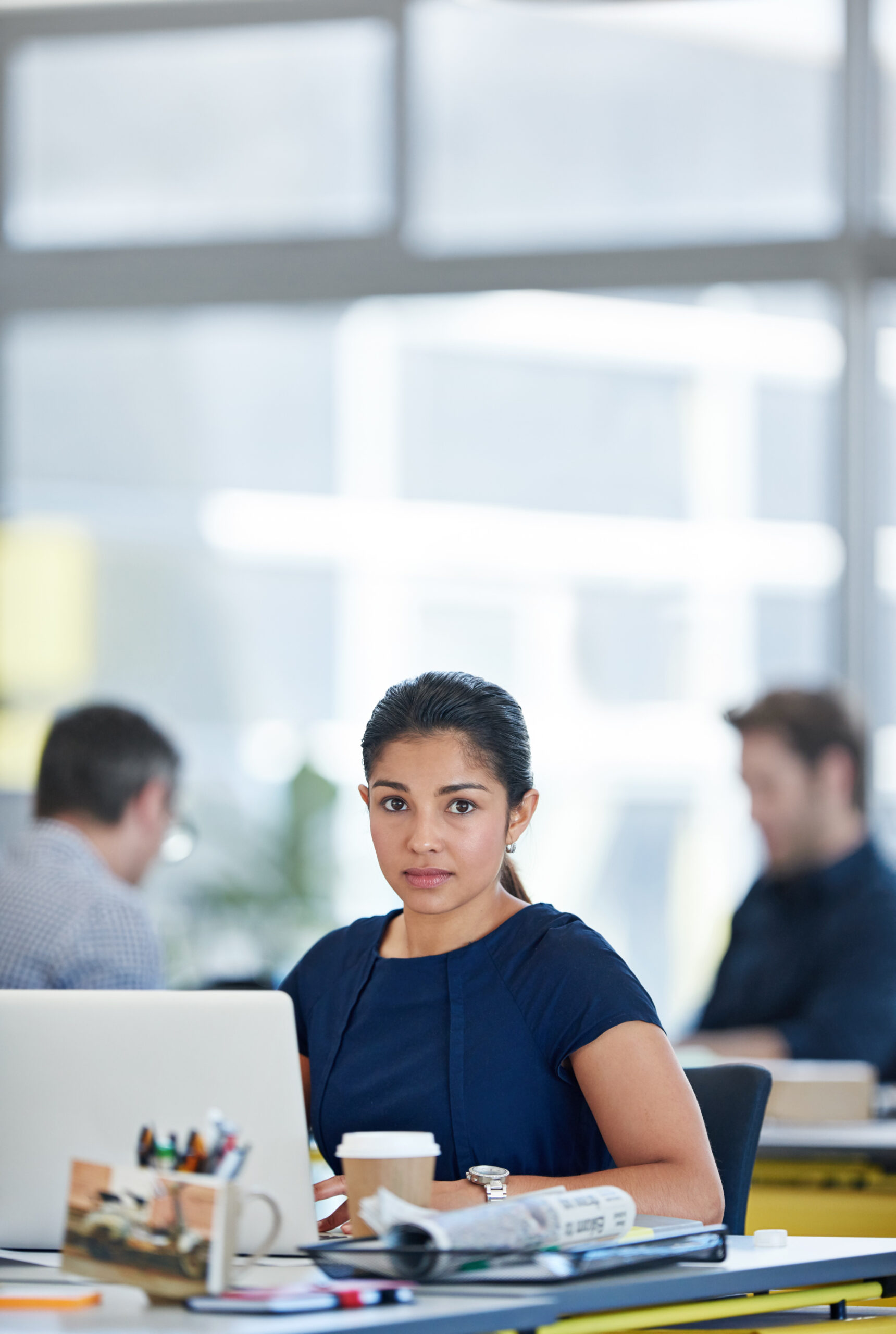 business woman laptop portrait as accountant professional administration financial firm female person corporate technology workload deadline concentration office desk